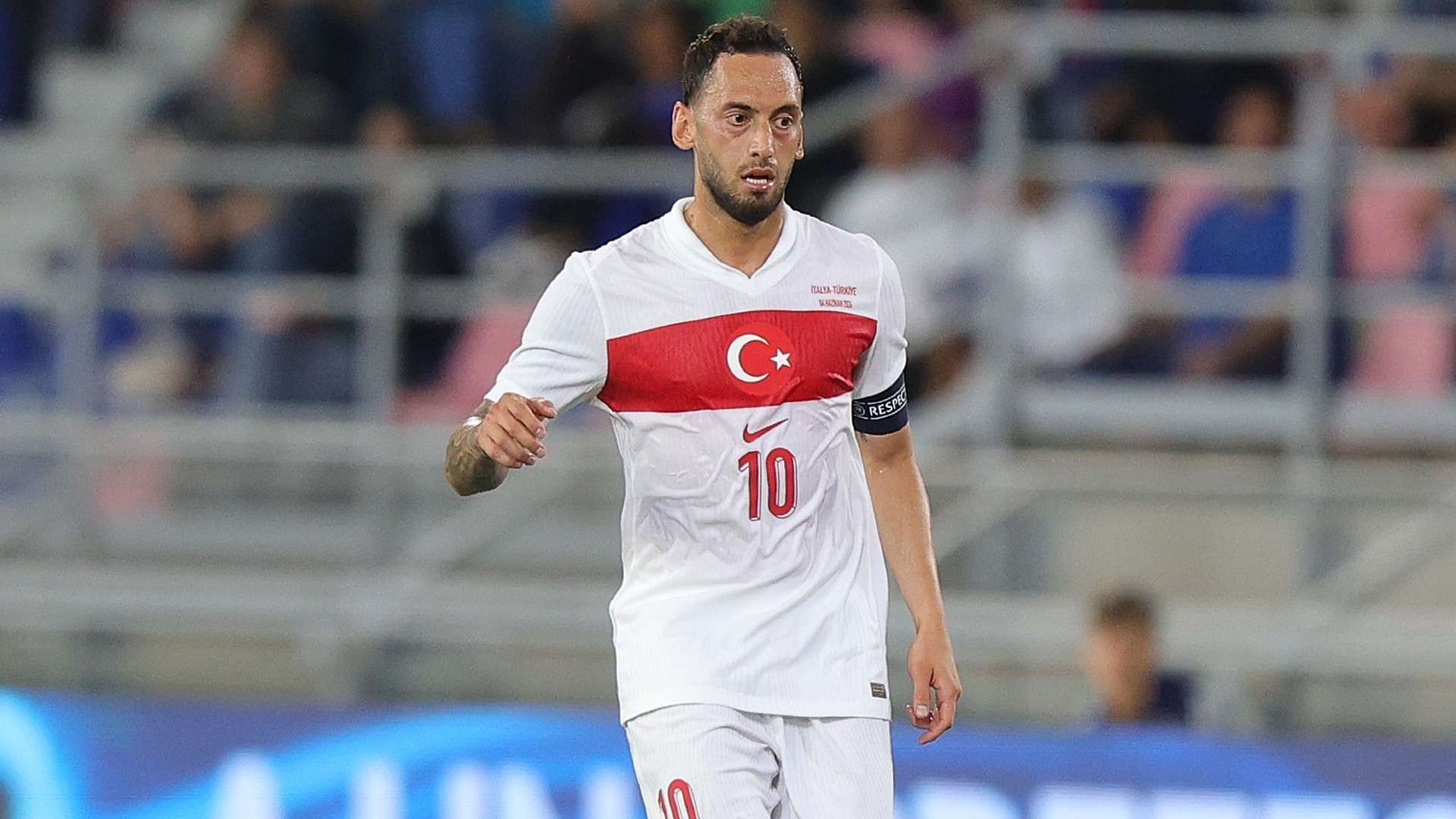 Hakan Calhanoglu of Turkiye in action