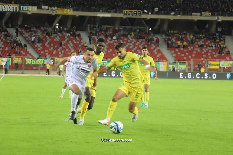 زيدان يحمل الشعلة الأولمبية في مارسيليا 